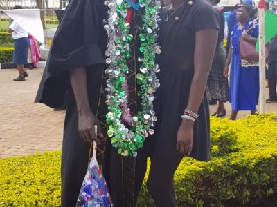 at the graduation with his sister Mwanasha