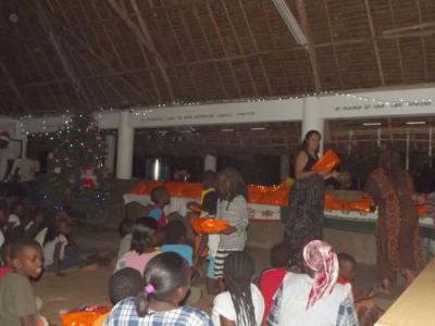 Denise handing over the presents